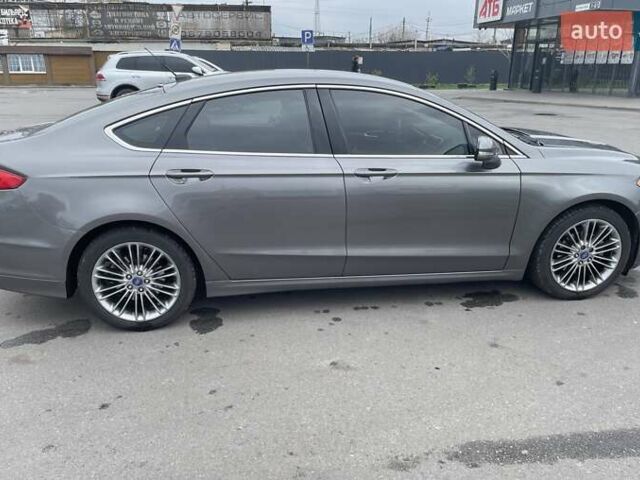 Сірий Форд Фьюжен, об'ємом двигуна 2 л та пробігом 158 тис. км за 10900 $, фото 5 на Automoto.ua