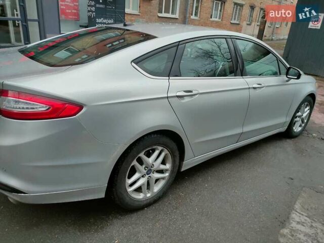 Серый Форд Фьюжн, объемом двигателя 1.6 л и пробегом 232 тыс. км за 8300 $, фото 6 на Automoto.ua