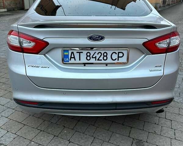 Серый Форд Фьюжн, объемом двигателя 1.6 л и пробегом 255 тыс. км за 8499 $, фото 7 на Automoto.ua