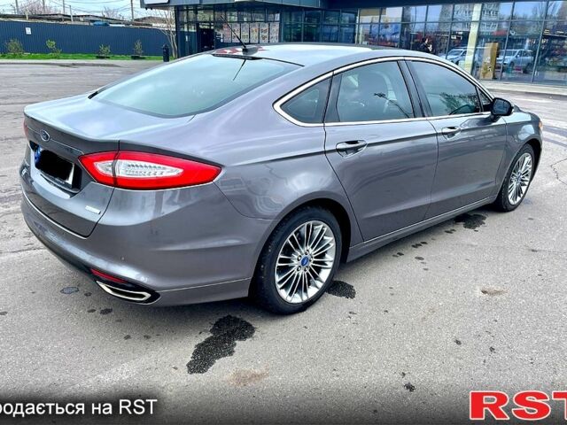 Сірий Форд Фьюжен, об'ємом двигуна 2 л та пробігом 169 тис. км за 9700 $, фото 4 на Automoto.ua