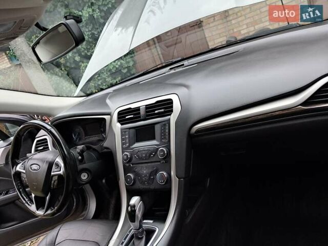 Серый Форд Фьюжн, объемом двигателя 1.6 л и пробегом 198 тыс. км за 8300 $, фото 10 на Automoto.ua