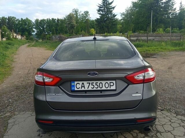 Серый Форд Фьюжн, объемом двигателя 1.6 л и пробегом 220 тыс. км за 6300 $, фото 7 на Automoto.ua