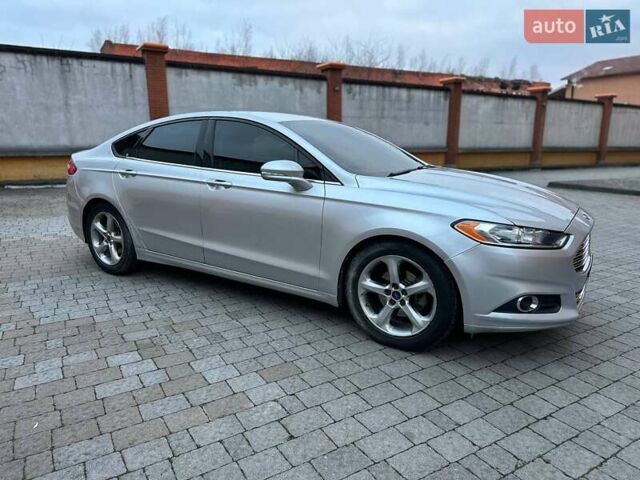 Серый Форд Фьюжн, объемом двигателя 1.6 л и пробегом 255 тыс. км за 8499 $, фото 4 на Automoto.ua