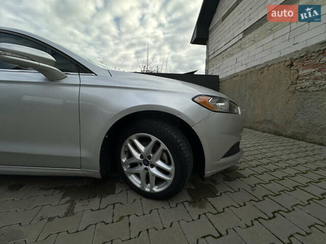 Серый Форд Фьюжн, объемом двигателя 2.5 л и пробегом 227 тыс. км за 8800 $, фото 11 на Automoto.ua