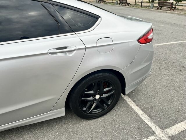 Серый Форд Фьюжн, объемом двигателя 2.5 л и пробегом 299 тыс. км за 8500 $, фото 4 на Automoto.ua