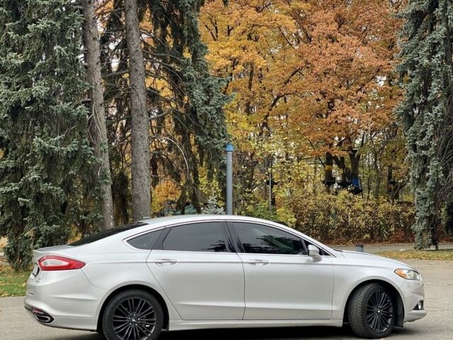 Сірий Форд Фьюжен, об'ємом двигуна 2 л та пробігом 167 тис. км за 12600 $, фото 4 на Automoto.ua