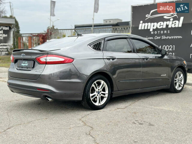 Серый Форд Фьюжн, объемом двигателя 2 л и пробегом 255 тыс. км за 10999 $, фото 5 на Automoto.ua