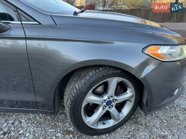 Сірий Форд Фьюжен, об'ємом двигуна 1.5 л та пробігом 248 тис. км за 7900 $, фото 4 на Automoto.ua