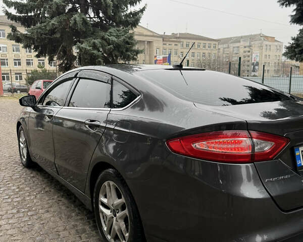 Серый Форд Фьюжн, объемом двигателя 2.5 л и пробегом 127 тыс. км за 10700 $, фото 3 на Automoto.ua