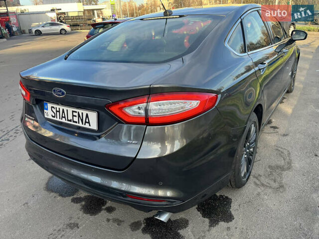 Сірий Форд Фьюжен, об'ємом двигуна 2 л та пробігом 167 тис. км за 13800 $, фото 4 на Automoto.ua