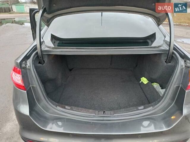 Сірий Форд Фьюжен, об'ємом двигуна 2 л та пробігом 121 тис. км за 12700 $, фото 14 на Automoto.ua