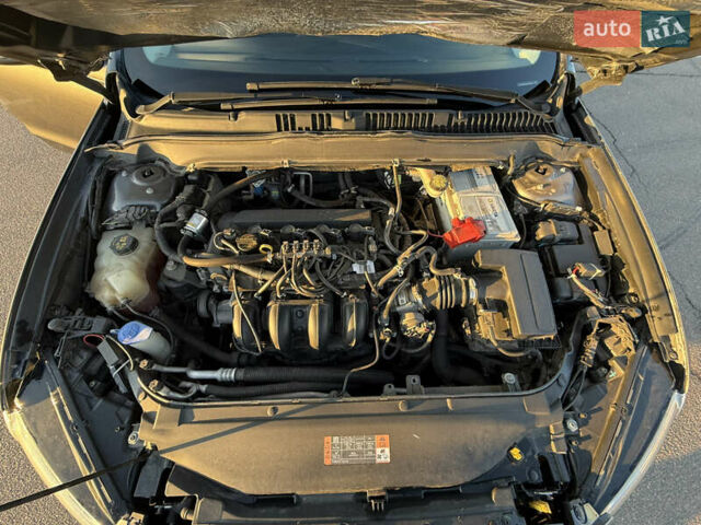 Серый Форд Фьюжн, объемом двигателя 2.49 л и пробегом 214 тыс. км за 9250 $, фото 20 на Automoto.ua