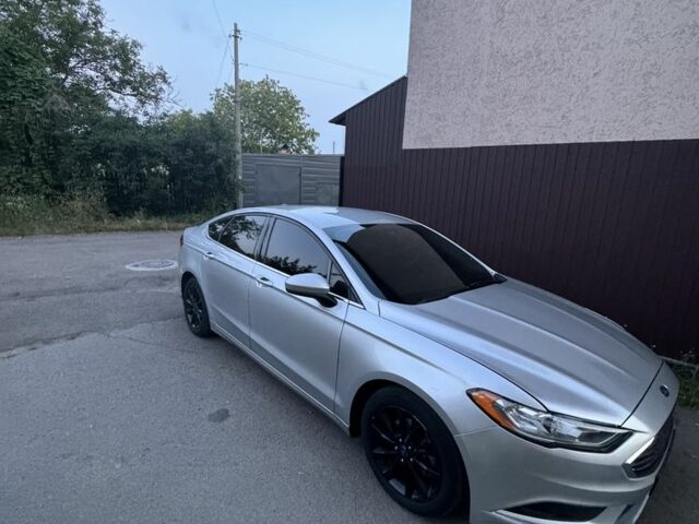 Серый Форд Фьюжн, объемом двигателя 2.5 л и пробегом 245 тыс. км за 8499 $, фото 1 на Automoto.ua