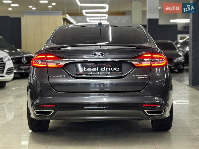 Серый Форд Фьюжн, объемом двигателя 2 л и пробегом 141 тыс. км за 13499 $, фото 6 на Automoto.ua