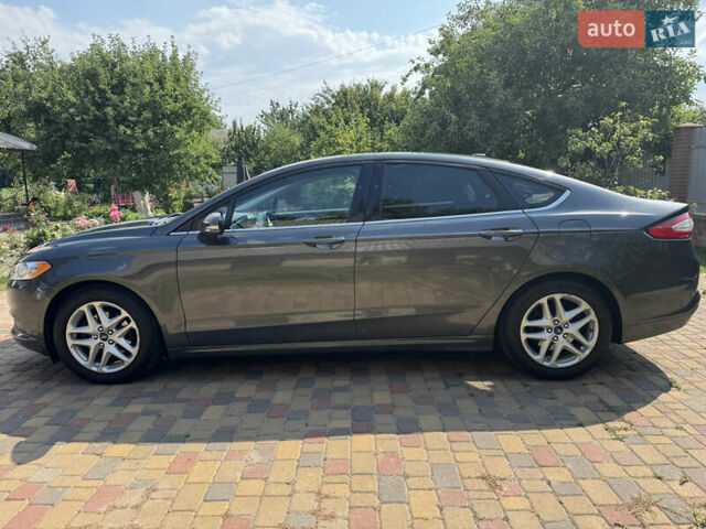 Серый Форд Фьюжн, объемом двигателя 1.5 л и пробегом 133 тыс. км за 10300 $, фото 6 на Automoto.ua