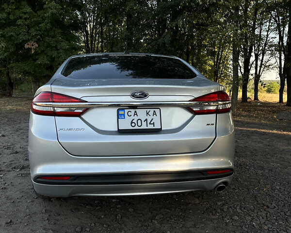 Сірий Форд Фьюжен, об'ємом двигуна 2.5 л та пробігом 158 тис. км за 11400 $, фото 5 на Automoto.ua