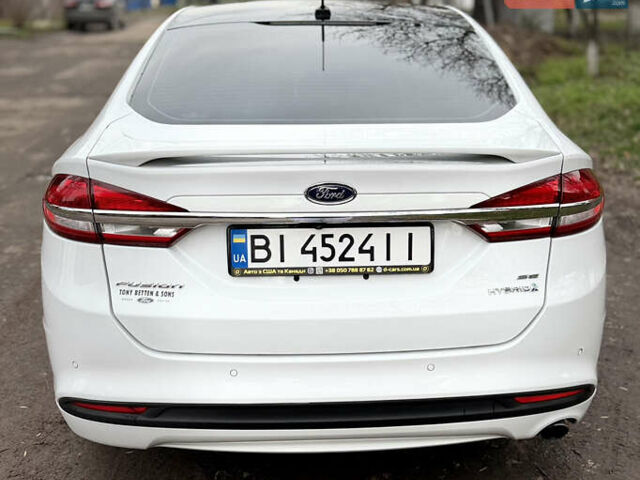 Сірий Форд Фьюжен, об'ємом двигуна 2 л та пробігом 200 тис. км за 14200 $, фото 4 на Automoto.ua