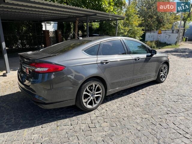 Сірий Форд Фьюжен, об'ємом двигуна 1.5 л та пробігом 162 тис. км за 8990 $, фото 5 на Automoto.ua