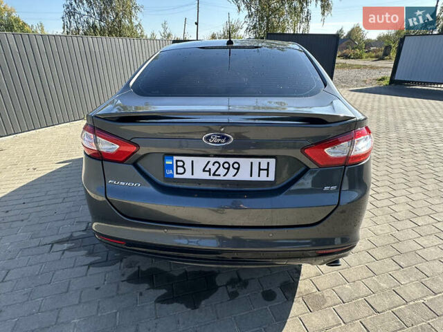 Серый Форд Фьюжн, объемом двигателя 2.5 л и пробегом 210 тыс. км за 11000 $, фото 11 на Automoto.ua