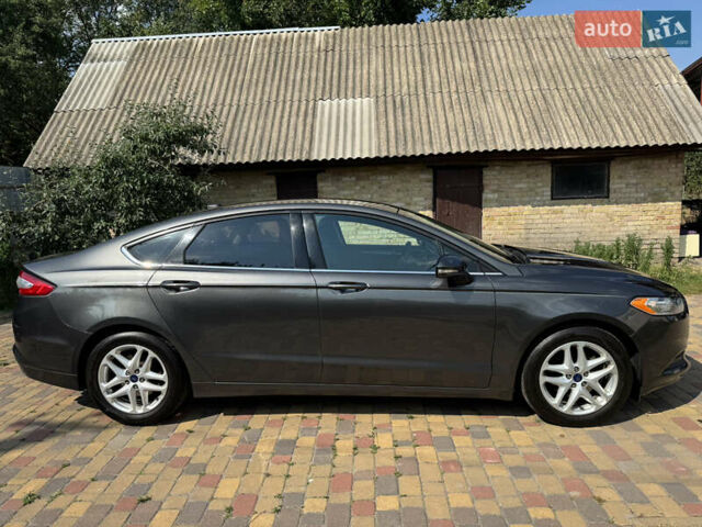 Серый Форд Фьюжн, объемом двигателя 1.5 л и пробегом 133 тыс. км за 10300 $, фото 7 на Automoto.ua