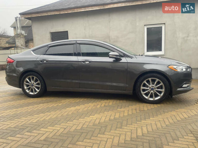 Серый Форд Фьюжн, объемом двигателя 2.5 л и пробегом 147 тыс. км за 13000 $, фото 4 на Automoto.ua