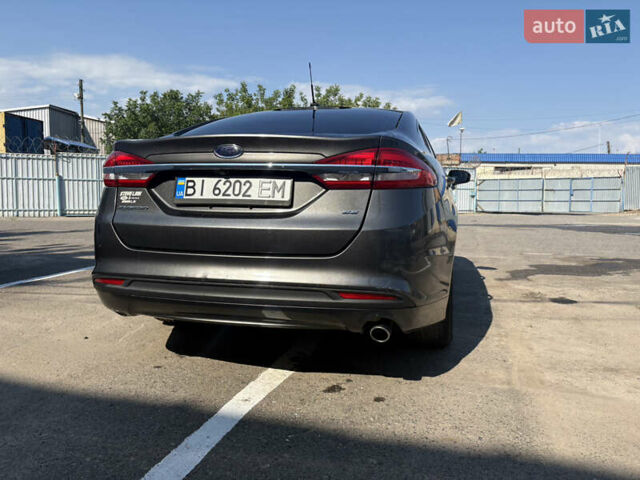 Серый Форд Фьюжн, объемом двигателя 2.49 л и пробегом 187 тыс. км за 12500 $, фото 6 на Automoto.ua