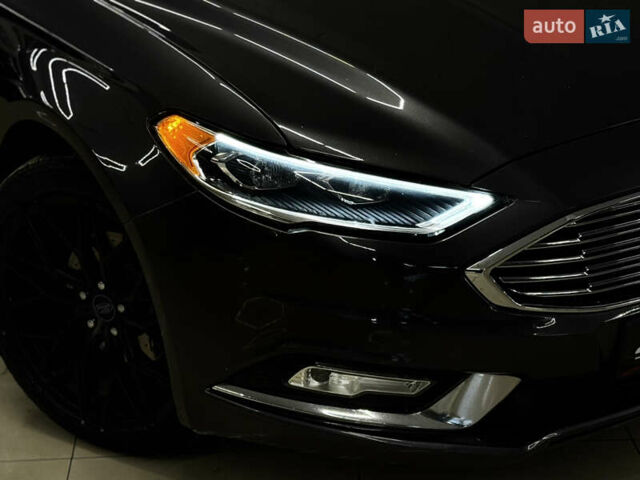 Серый Форд Фьюжн, объемом двигателя 2 л и пробегом 141 тыс. км за 13499 $, фото 3 на Automoto.ua