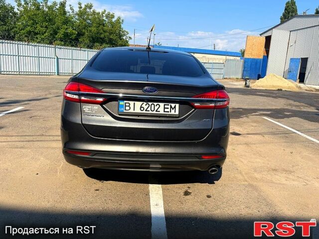 Серый Форд Фьюжн, объемом двигателя 2.5 л и пробегом 100 тыс. км за 12500 $, фото 4 на Automoto.ua