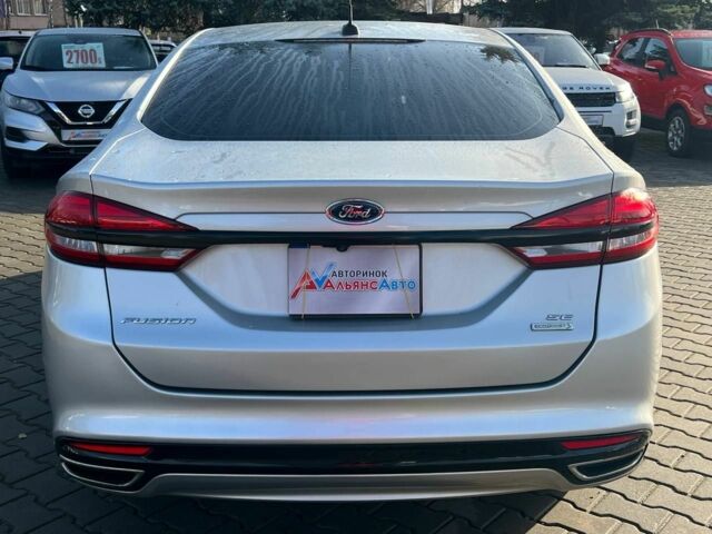 Сірий Форд Фьюжен, об'ємом двигуна 2 л та пробігом 200 тис. км за 10900 $, фото 5 на Automoto.ua