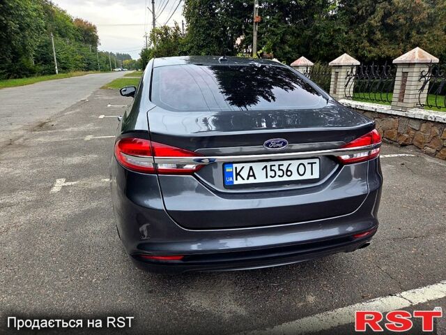 Серый Форд Фьюжн, объемом двигателя 2 л и пробегом 220 тыс. км за 12300 $, фото 5 на Automoto.ua