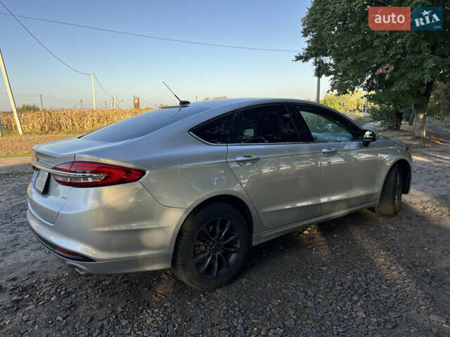Сірий Форд Фьюжен, об'ємом двигуна 2.5 л та пробігом 158 тис. км за 11400 $, фото 7 на Automoto.ua