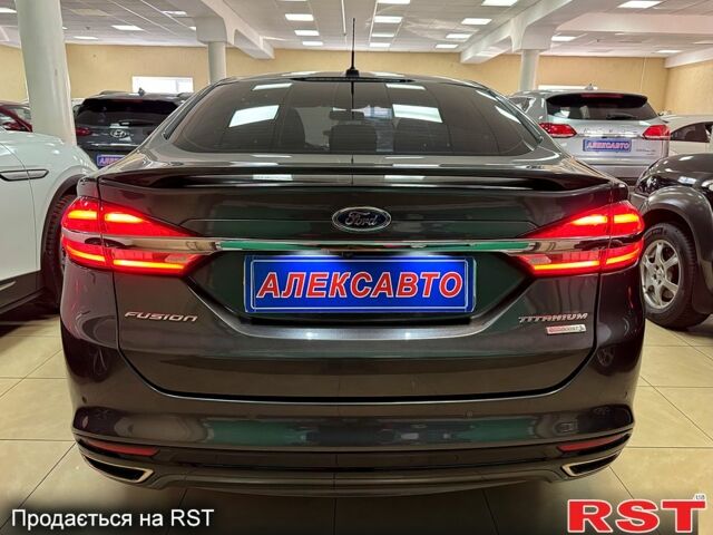 Серый Форд Фьюжн, объемом двигателя 2 л и пробегом 169 тыс. км за 10300 $, фото 3 на Automoto.ua