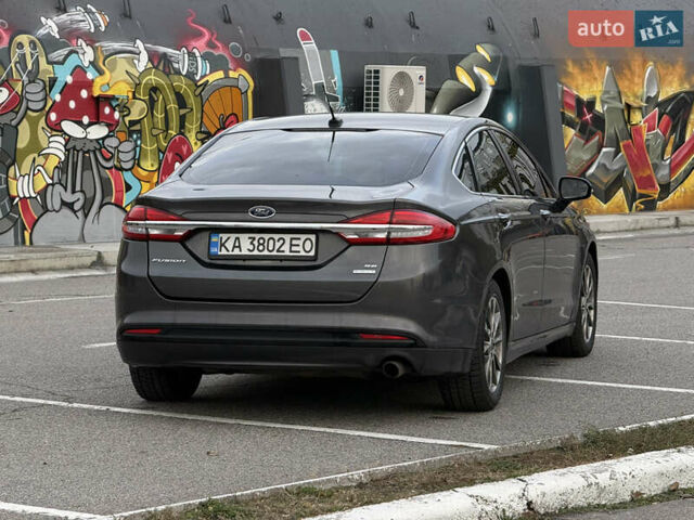 Серый Форд Фьюжн, объемом двигателя 1.5 л и пробегом 237 тыс. км за 10500 $, фото 5 на Automoto.ua