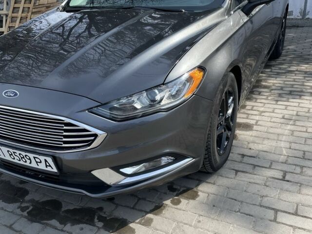 Серый Форд Фьюжн, объемом двигателя 2.5 л и пробегом 175 тыс. км за 13774 $, фото 1 на Automoto.ua