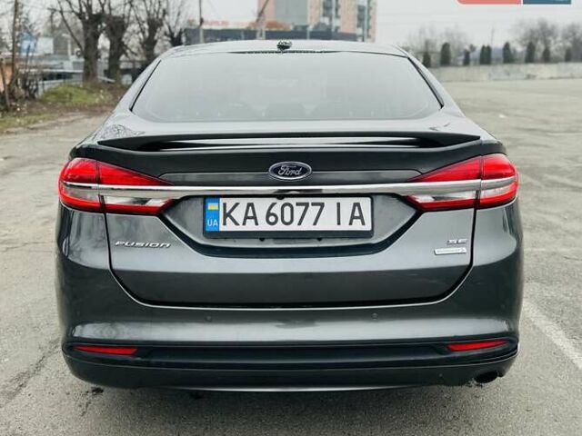 Серый Форд Фьюжн, объемом двигателя 1.5 л и пробегом 92 тыс. км за 6300 $, фото 5 на Automoto.ua