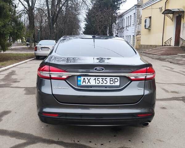 Серый Форд Фьюжн, объемом двигателя 2.5 л и пробегом 146 тыс. км за 13500 $, фото 4 на Automoto.ua