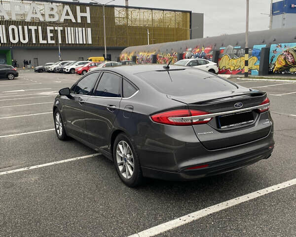 Серый Форд Фьюжн, объемом двигателя 2 л и пробегом 261 тыс. км за 14000 $, фото 3 на Automoto.ua