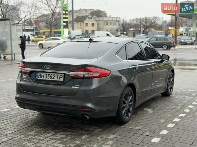 Серый Форд Фьюжн, объемом двигателя 1.5 л и пробегом 165 тыс. км за 10200 $, фото 5 на Automoto.ua