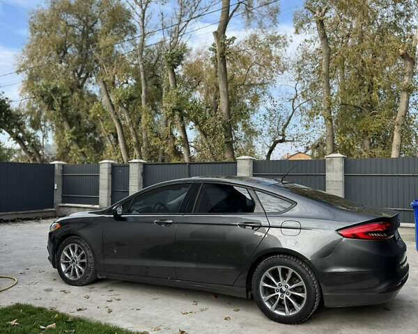 Сірий Форд Фьюжен, об'ємом двигуна 1.5 л та пробігом 160 тис. км за 9900 $, фото 3 на Automoto.ua