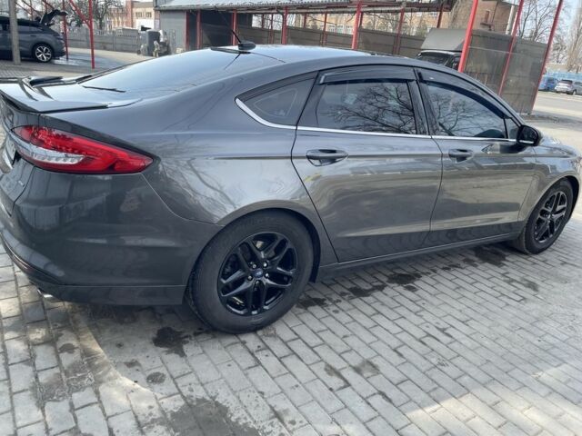 Серый Форд Фьюжн, объемом двигателя 2.5 л и пробегом 175 тыс. км за 13774 $, фото 3 на Automoto.ua