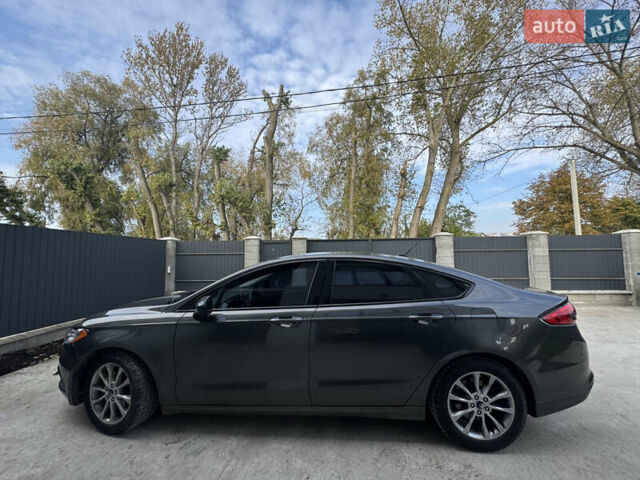 Сірий Форд Фьюжен, об'ємом двигуна 1.5 л та пробігом 160 тис. км за 9900 $, фото 7 на Automoto.ua