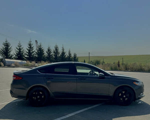 Серый Форд Фьюжн, объемом двигателя 2.5 л и пробегом 103 тыс. км за 11900 $, фото 6 на Automoto.ua