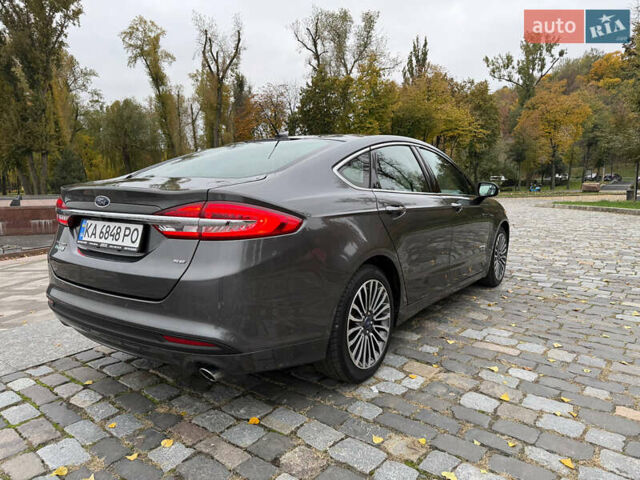 Серый Форд Фьюжн, объемом двигателя 2 л и пробегом 146 тыс. км за 15000 $, фото 6 на Automoto.ua