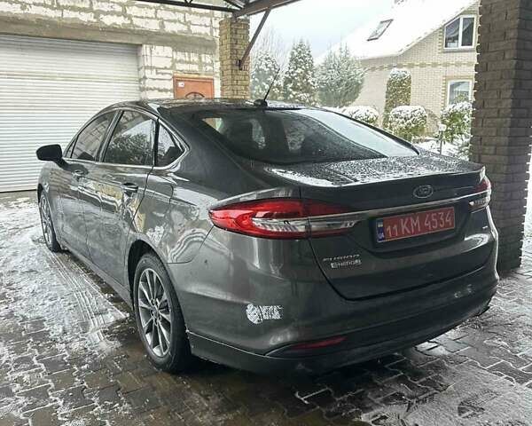 Серый Форд Фьюжн, объемом двигателя 2 л и пробегом 106 тыс. км за 12900 $, фото 7 на Automoto.ua