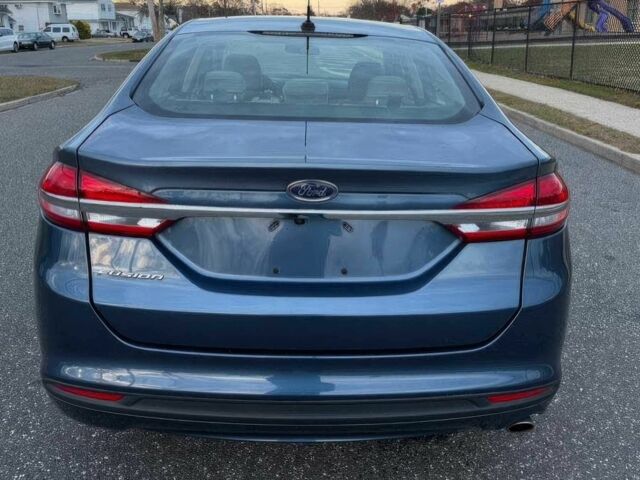 Серый Форд Фьюжн, объемом двигателя 2.5 л и пробегом 38 тыс. км за 2300 $, фото 5 на Automoto.ua