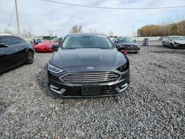 Серый Форд Фьюжн, объемом двигателя 2 л и пробегом 65 тыс. км за 3500 $, фото 1 на Automoto.ua