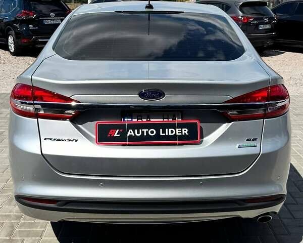 Серый Форд Фьюжн, объемом двигателя 1.5 л и пробегом 102 тыс. км за 12600 $, фото 3 на Automoto.ua