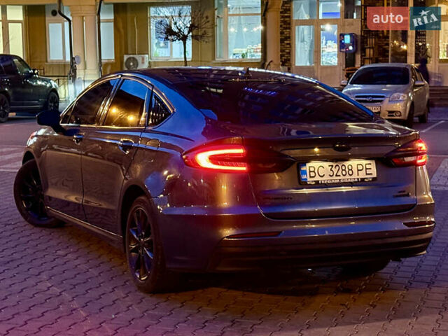 Сірий Форд Фьюжен, об'ємом двигуна 2 л та пробігом 176 тис. км за 11500 $, фото 4 на Automoto.ua