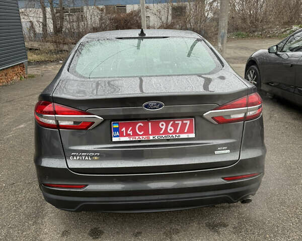 Серый Форд Фьюжн, объемом двигателя 1.5 л и пробегом 165 тыс. км за 10999 $, фото 5 на Automoto.ua