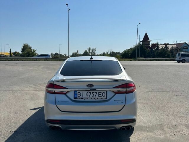 Серый Форд Фьюжн, объемом двигателя 2.7 л и пробегом 97 тыс. км за 14000 $, фото 1 на Automoto.ua
